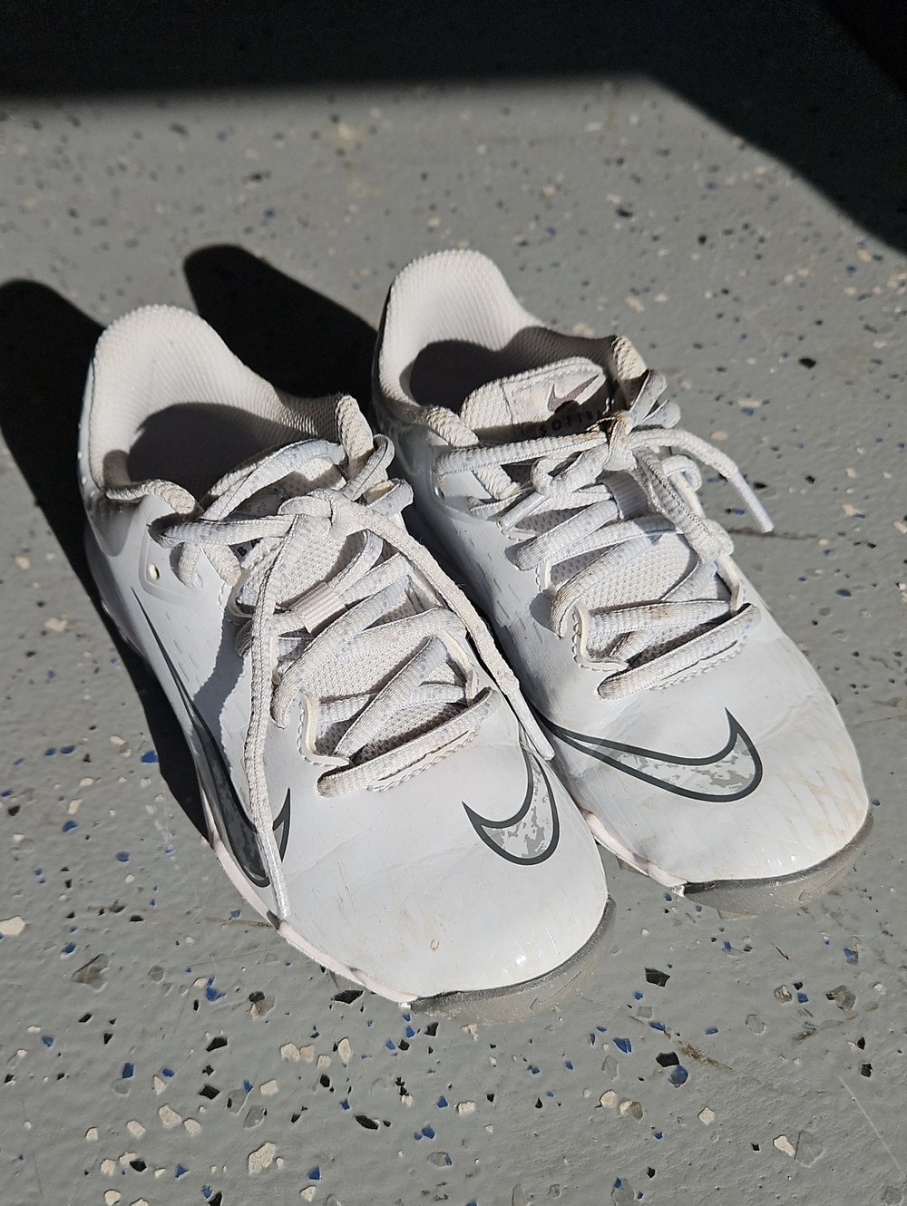 Nike White Cleats with Gray Swoosh